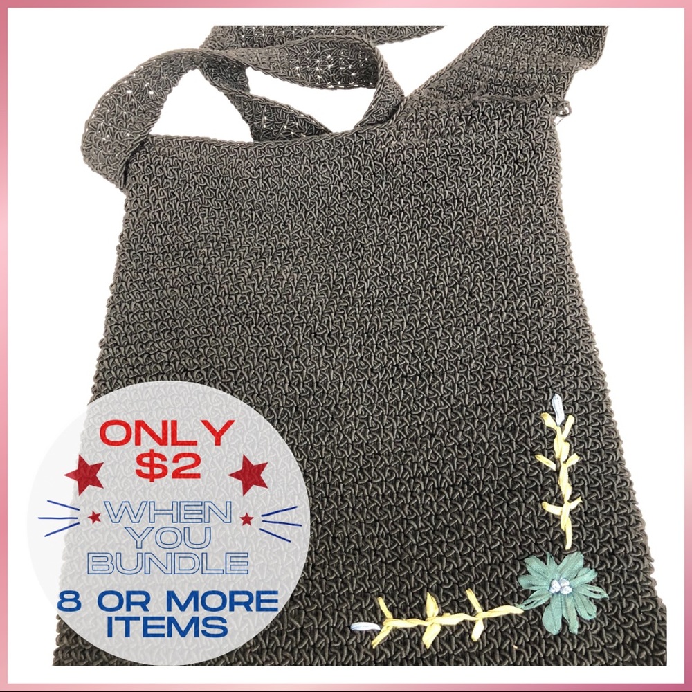 Woven crossbody with lovely flower accent